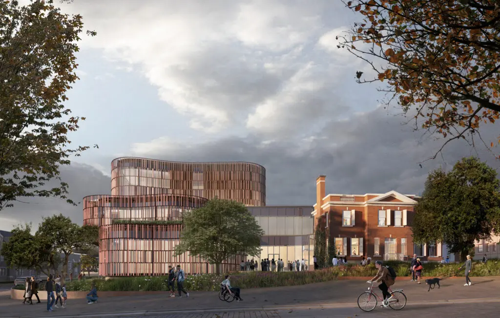 A rendering for a reimagining of the Agnes Etherington Art Centre, showing the existing, red heritage building next to a larger, more modern building with a unique pattern on the facade.