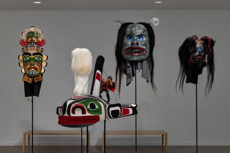 Installation view of 5 masks carved by Beau Dick in the exhibition "We who have known tides: Indigenous Art from the Collection."