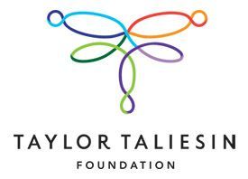 A logo for the Taylor Taliesin Foundation with their name in black text at the bottom and a colourful, line drawn butterfly-like design above in blue, orange, green, and purple.