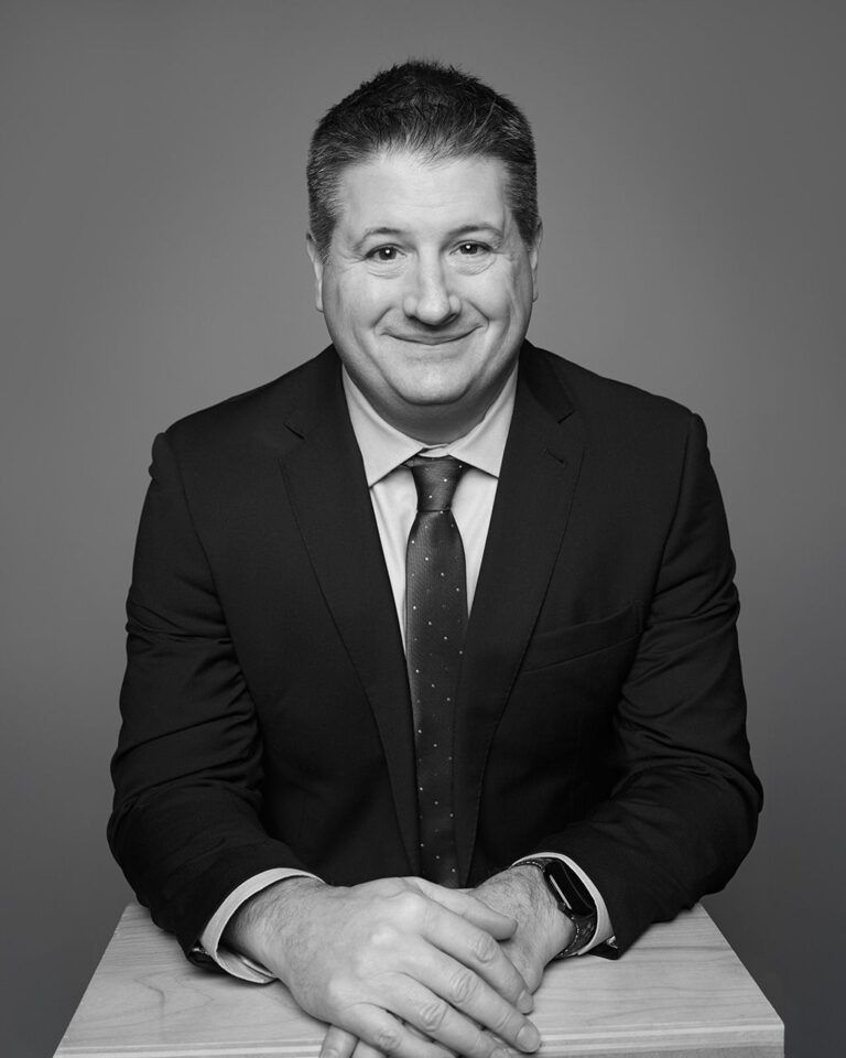 Black and white headshot of Rod Foley